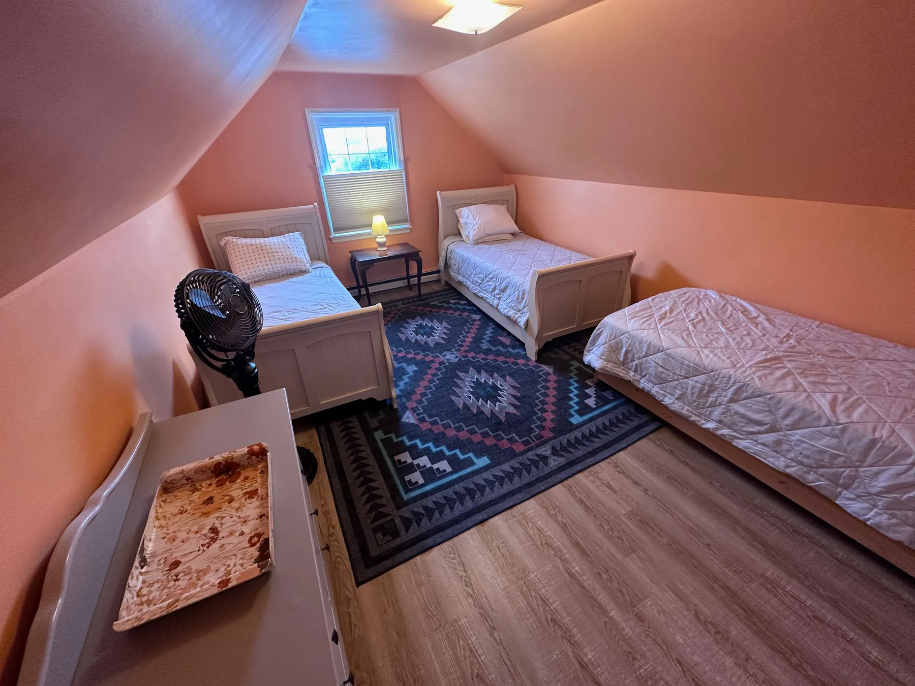 Bedroom with three twin beds